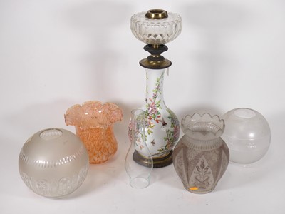 Lot 79 - A 19th century oil lamp, having a cut glass...
