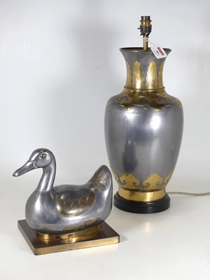 Lot 84 - A Chinese pewter figure of a duck, on a brass...