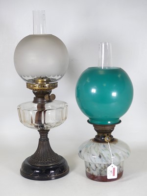 Lot 87 - An early 20th century oil lamp, having a...