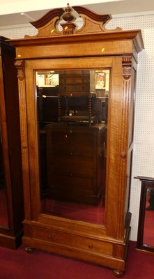 Lot 1147 - A circa 1900 French walnut single door glazed...