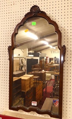 Lot 1132 - After Chippendale - a mahogany framed wall...