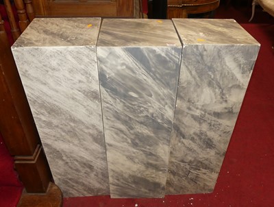 Lot 1138 - A set of three faux marble painted composition...