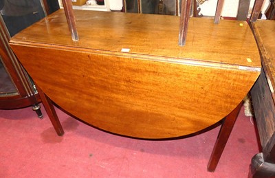 Lot 1173 - A 19th century mahogany drop leaf dining table