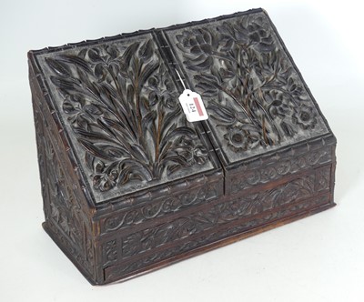 Lot 124 - An Indian carved hardwood stationary box,...