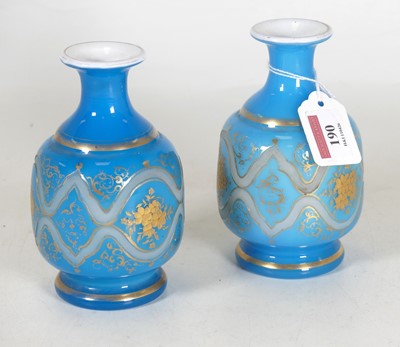 Lot 190 - A pair of Bohemian blue overlaid glass vases,...