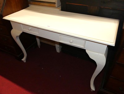 Lot 1216 - A white painted hardwood two-drawer hall table,...