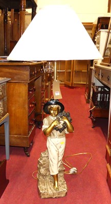 Lot 1229 - A painted and gilded plaster table lamp,...