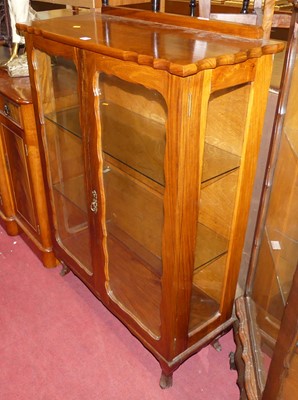 Lot 1231 - Two early 20th century walnut double-door...