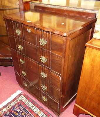 Lot 1233 - A camphor wood ledgeback chest of five long...
