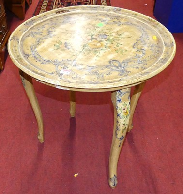 Lot 1235 - An Italian cream and floral painted circular...