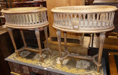 Lot 1246 - A pair of French limed oval jardiniere stands,...