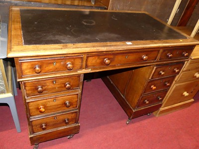 Lot 1251 - A mid-Victorian mahogany and hide inset twin...