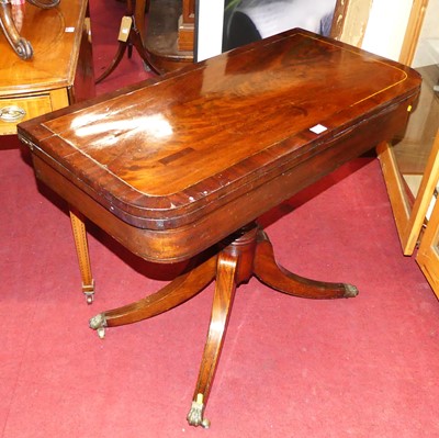 Lot 1253 - A Regency mahogany crossbanded and brass...