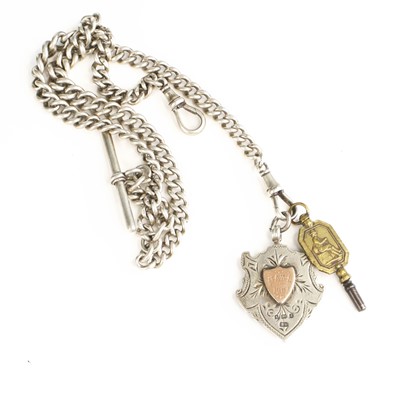 Lot 371 - An Edwardian silver metal fob of shield shape...