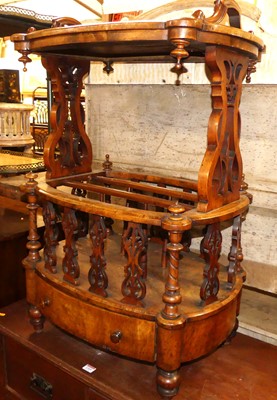 Lot 1268 - A mid-Victorian figured walnut canterbury...