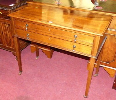Lot 1273 - An early 20th century walnut two-drawer...