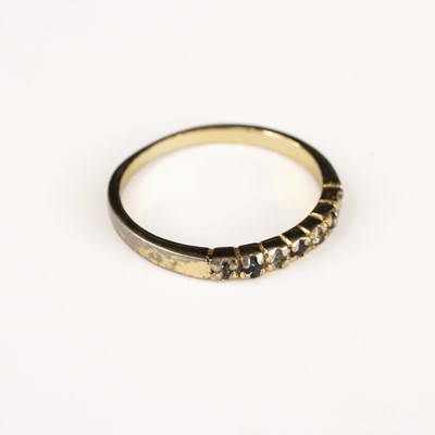 Lot 286 - A gilt metal, sapphire and white paste set...