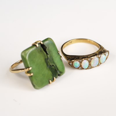 Lot 288 - A circa 1910 18ct carved gold cabochon opal...