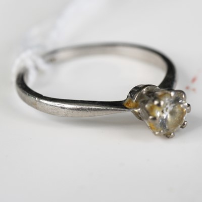 Lot 296 - A platinum and white paste set solitaire ring,...
