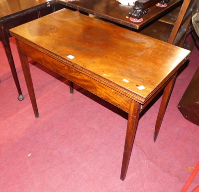 Lot 1285 - An early 19th century mahogany fold-over tea...