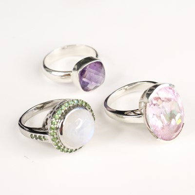 Lot 299 - A modern silver and kunzite set dress ring;...