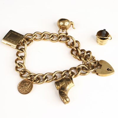 Lot 305 - A 9ct gold curblink bracelet, with heart...