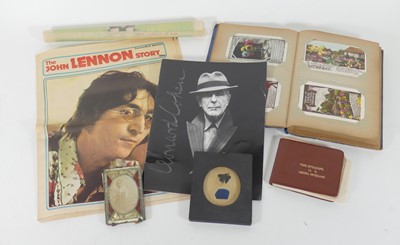 Lot 465 - An early 20th century postcard album,...