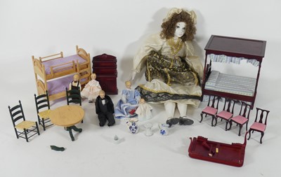 Lot 472 - A collection of dolls and doll's house...
