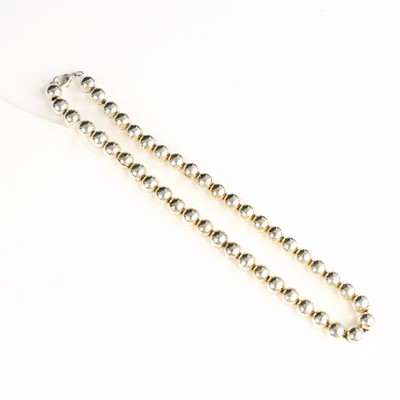 Lot 319 - A modern beaded white metal necklace, with...