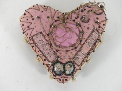 Lot 479 - A Victorian sweetheart beadwork pin cushion,...