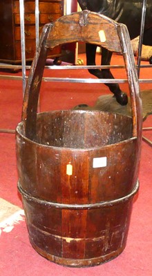 Lot 1304 - A stained hard wood and metal bound grain bucket