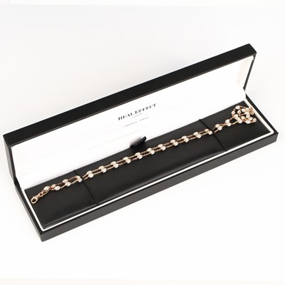 Lot 335 - A Real Effect of London silver-gilt necklace;...