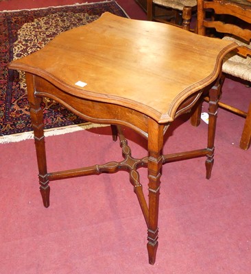 Lot 1309 - An Edwardian walnut shaped top occasional...
