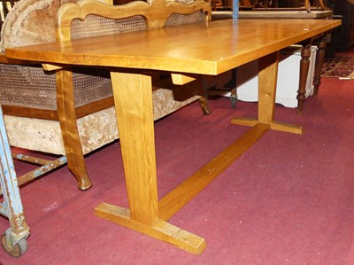 Lot 1311 - A contemporary blond oak rectangular dining...