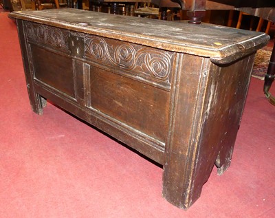 Lot 1320 - An 18th century joined oak twin panelled hinge...