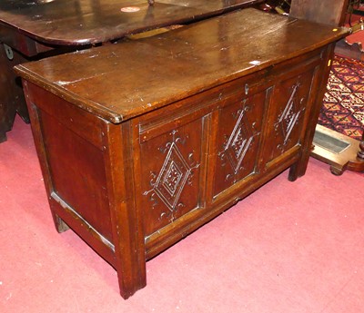Lot 1321 - An 18th century joined oak three-panelled...
