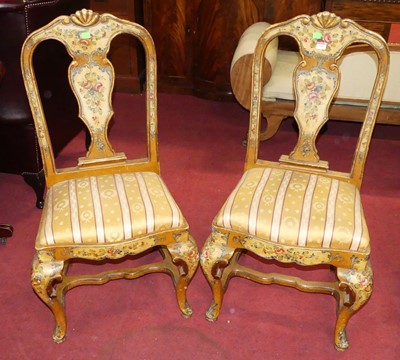 Lot 1335 - A pair of Italian cream and floral polychrome...