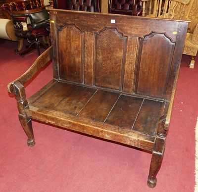 Lot 1340 - An antique joined oak three panelled plank...