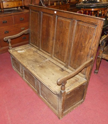 Lot 1341 - An antique joined oak four panelled hinged box...