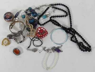 Lot 447 - A collection of costume jewellery, to include...