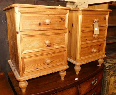 Lot 1366 - A pair of modern pine round cornered three...