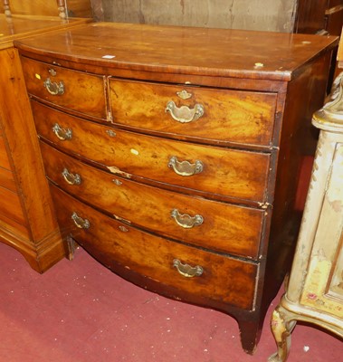 Lot 1367 - A Regency mahogany bowfront chest of two short...