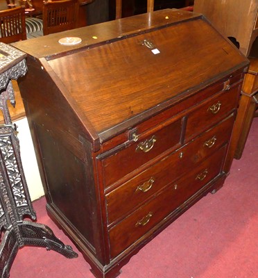 Lot 1373 - A provincial elm slope front bureau, having...