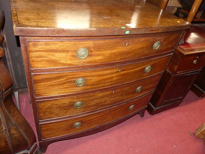 Lot 1380 - A Regency mahogany and crossbanded bow front...