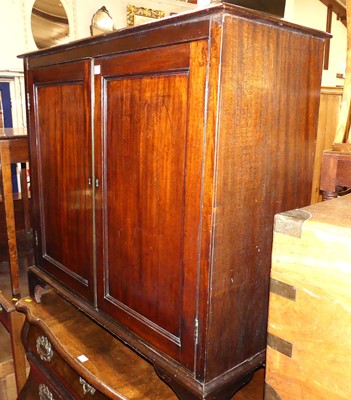 Lot 665 - A 19th century mahogany double door low side...