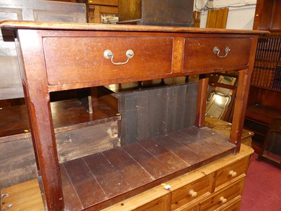 Lot 1386 - A joined cherry wood two-drawer dresser base,...