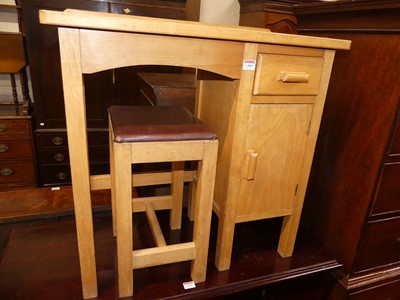 Lot 1389 - A beech child's kneehole school desk, with...