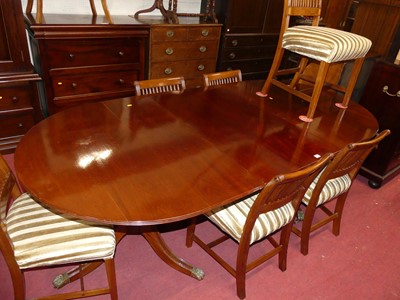 Lot 1392 - A mahogany twin pillar dining table, in the...