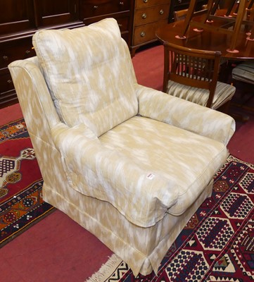 Lot 1393 - A Wesley-Barrell fabric armchair, upholstered...