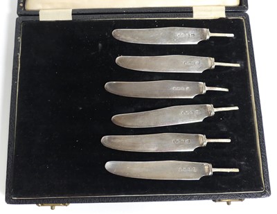 Lot 259 - A set of six George VI silver tea knife blades,...